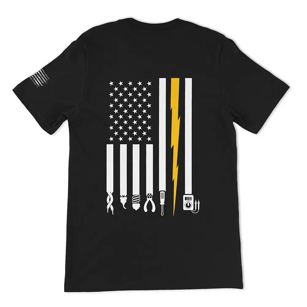 Black t-shirt with vertical American Flag in white, with one Yellow stripe shaped like a lightening bolt and electrician tools at the end of each white stripe on the back of the shirt. White worn American flag on the left sleeve.
