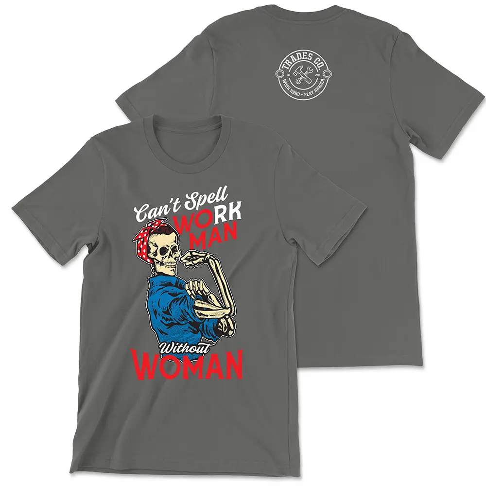Gray t-shirt with text "Can't Spell workman without woman" "Can't Spell and Without are in white script. "Work Man" is in all caps with the WO and MAN in red text and the RK in white text. Woman is in all caps red text at the bottom. There is a a skeleton torso up (no legs) with a blue jumpsuit on and a red headband with white polka dots posing like Rosie the riveter.