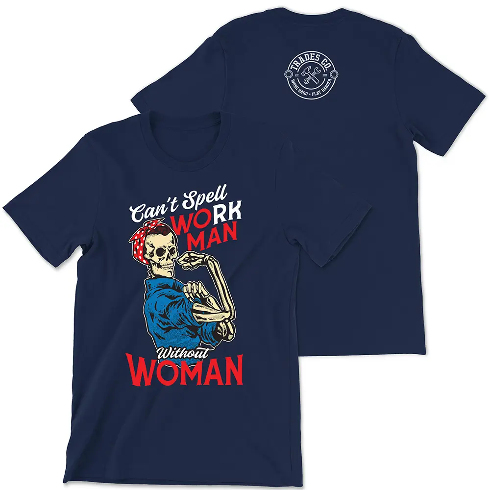 Navy blue shirt with text "Can't Spell workman without woman" "Can't Spell and Without are in white script. "Work Man" is in all caps with the WO and MAN in red text and the RK in white text. Woman is in all caps red text at the bottom. There is a a skeleton torso up (no legs) with a blue jumpsuit on and a red headband with white polka dots posing like Rosie the riveter. Small white Trades Co. Logo featured on the upper center back of the t-shirt.